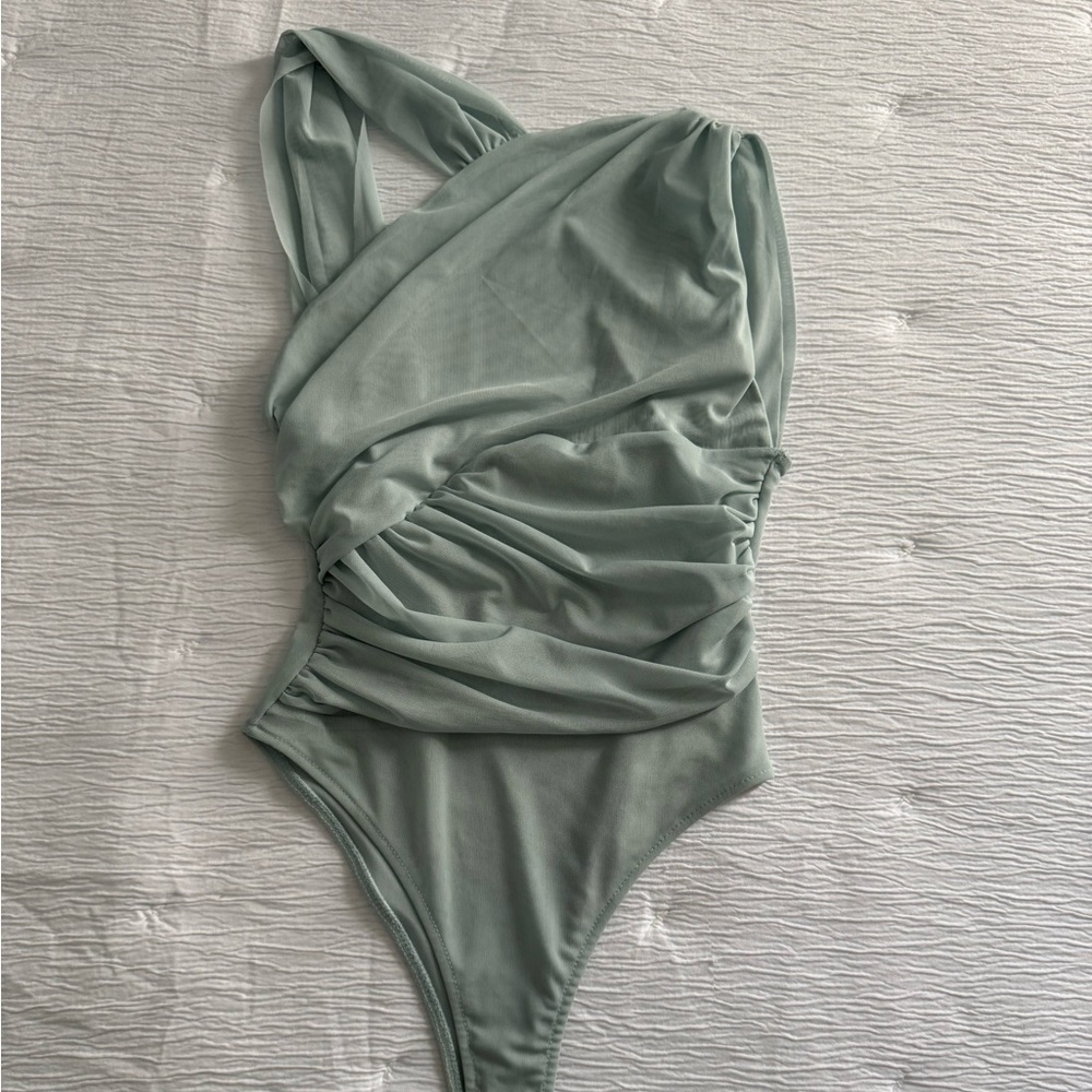 light blue mesh like bodysuit